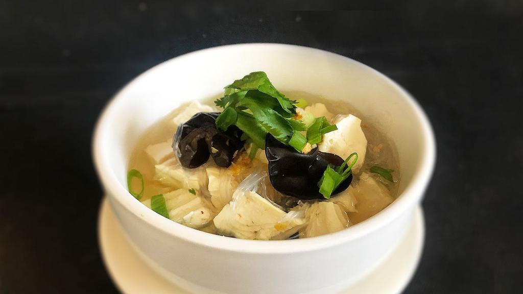 Mai Thai Tofu Soup · Vegetarian. Soft White Tofu | Glass Noodles | Preserved Cabbage | Scallion |Wood Ear Mushroom | Cilantro | Clear Broth | A Hint of Garlic