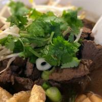 Boat Noodle Soup · Spicy. Thin Rice Pho Noodles | Sliced Beef | Tender Beef Chunk | Homemade Pork Ball | Bean S...