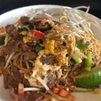 Pad Thai · Nuts, gluten free, vegetarian. Choice of meat, stir-fried thin rice noodles, egg, bean sprou...