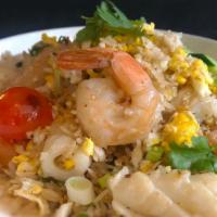 Godzilla Fried Rice Ⓖ  · Gluten free. Crab Meat | Shrimp | Squid | Broccoli | Carrot | Cilantro | Egg | Onion | Scall...