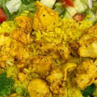 Rice And Chicken Bowl  · Your gonna love this New York style dish! Yellow rice topped with grilled seasoned boneless ...