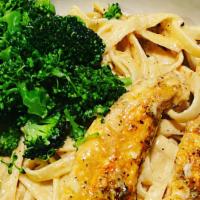 Fettuccini Alfredo With Broccoli  · Creamy Alfredo sauce cooked to perfection with garlic butter broccoli and topped with Parmes...