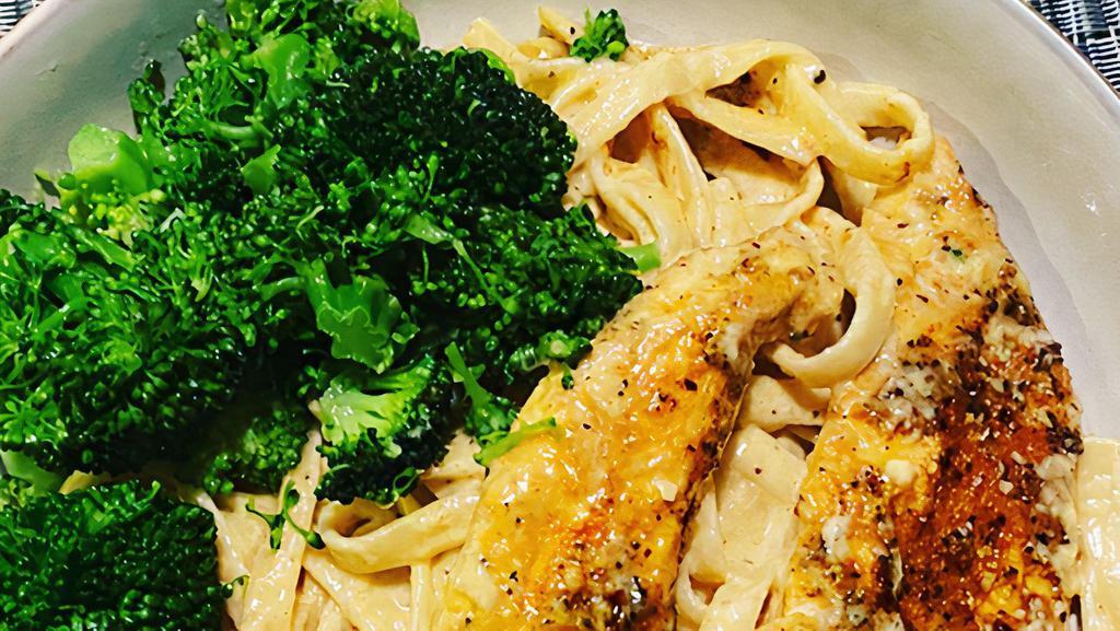 Fettuccini Alfredo With Broccoli  · Creamy Alfredo sauce cooked to perfection with garlic butter broccoli and topped with Parmesan cheese