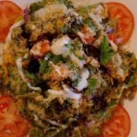 Palak Chat · Vegan. Fresh spinach dipped in special batter, deep fried, served with onion, tomatoes, mint...