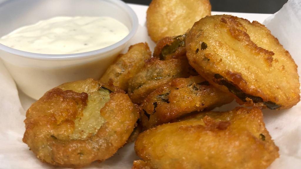 Fried Pickles · Beer Battered Pickle Chips.
Served with a side Ranch Dressing