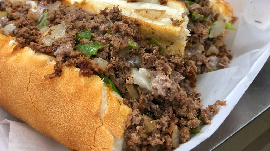 Steak Bomb Sub Or Wrap · Steak, cheese, onions, mushrooms and green peppers.