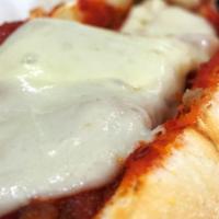 Chicken Parmesan Sub Or Wrap · Chicken cutlet, sauce and provolone cheese.