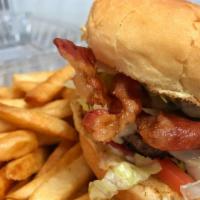 Bacon Deluxe Cheeseburger · Bacon, lettuce, tomatoes, American cheese and mayonnaise. Served on a bulkie roll with choic...