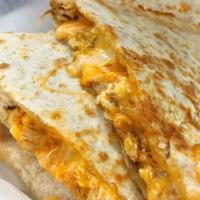 Buffalo Chicken Quesadilla · Melted  Monterey Jack and Cheddar Cheeses, Buffalo Grilled Chicken, Bleu Cheese and Tomatoes...