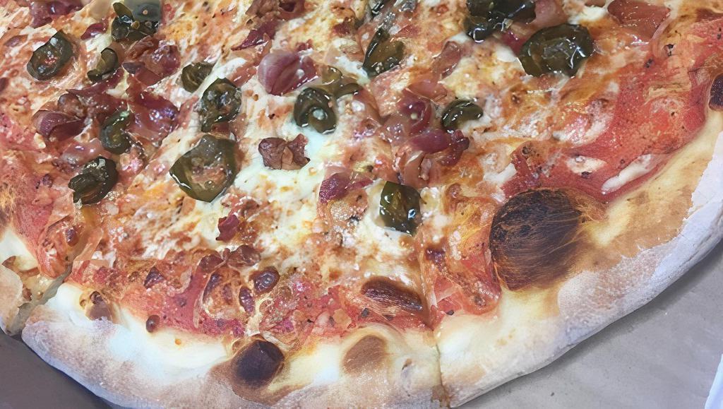 The Skinny Malink · A cheese pie with house cured and smoked bacon and candied jalapeños.