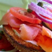Lox Bagel · Smoked salmon, cream cheese, tomato, cucumber, onion, sprouts and capers.