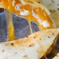 Cheese Quesadilla · A Flour tortilla,cheese, fries