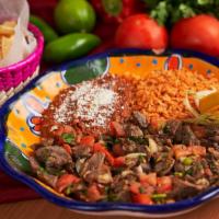 Steak Ranchero Plate · Sauteed lean steak strips, with onion, tomatoes, jalapeños, cilantro and ranchero salsa..