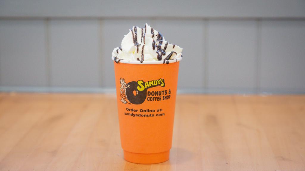 Hot Chocolate (16 Oz) · steamed chocolate milk and topped with whipped cream and chocolate drizzle
