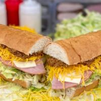 Ham Grinder - Whole · A 13 inch craft sub bun with our White Sauce, Lettuce, Hot Sauce, Ham and Swiss Cheese. Add ...