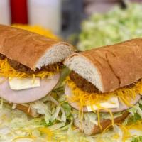Turkey Grinder - Whole · A 13 inch craft sub bun with our White Sauce, Lettuce, Hot Sauce, Turkey and Swiss Cheese. A...