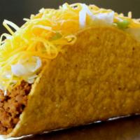 Hard Shell Beef Taco · Enjoy tasty taco meat, lettuce, a squirt of hot sauce and freshly grated Colby cheese. Glute...