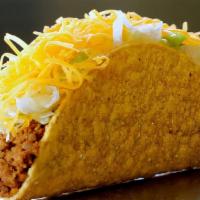 Hard Shell Combo Taco · Enjoy tasty taco meat and refried beans, lettuce, a squirt of hot sauce and freshly grated C...