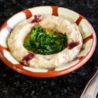 Baba Ghanoug · Baked aubergine eggplant blended with tahini sauce, lemon, and garlic topped with olive oil ...