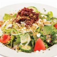 Maestro Salad  · A mixture of romaine lettuce, tomatoes, cucumbers, green peppers, mint and carrots tossed in...