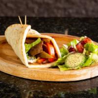 Greek Gyros · Generous slices of seasonal lamb and beef meat slow-cooked and served with lettuce, tomatoes...