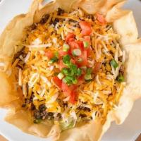 Taco Salad · Beef, chicken, or black beans, lettuce, tomato, green onion, cheese