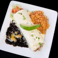 Avocado Burrito · Green chili pork, fresh avocado, iguana dip (served with black beans and rice)