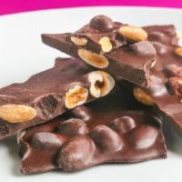 Chocolate Bark · Creamy chocolate with hazelnut and almonds. Choose from milk, dark or white chocolate.