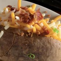 Baked Potato Loaded · Butter, mixed cheese, bacon bits, chives, and sour cream topping