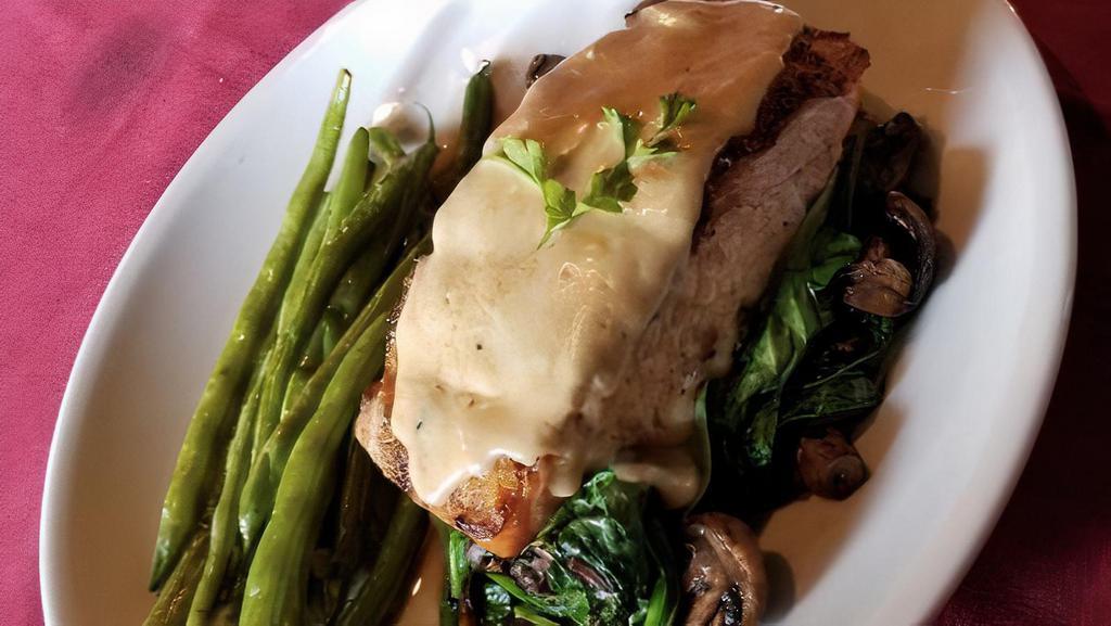 Salmon Yvette · Mushrooms and spinach in a sherry & cream sauce. Served with a choice of soup or salad.