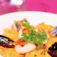 Pasta  Del Mare · Scallops, shrimp, clams, mussels in a white wine seafood sauce. Served with a cup of soup or...