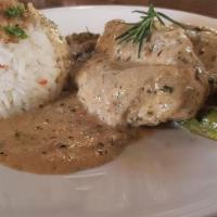 French Tarragon Chicken · Try our grilled chicken breast over rice, topped with a creamy tarragon sauce. Served with a...