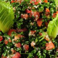 Tabouleh · Freshly chopped parsley, red onions, tomatoes and bulgar wheat tossed with lemon juice, oliv...
