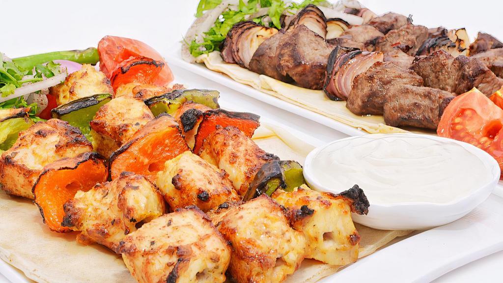Ground Chicken Kabob · Ground Chicken skewered and seasoned with Middle Eastern Spices Grilled 

Choose two sides 
French Fries, Hummus, Basmati Rice with Almonds or Greek Salad