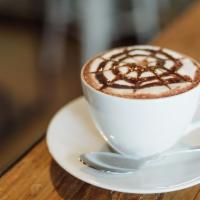 Mocha Latte Double · Steam milk with Chocolate atop two esspresso and topped with homemade whip cream and garnish...