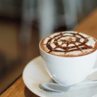 Mocha Latte (Large) · Steam milk with Chocolate atop three esspressos and topped with homemade whipcream and garni...