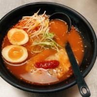 Aoyama Spicy Tonkotsu Ramen · Pork bone broth seasoned with soy and house spicy paste, topped with chashu, egg, bean sprou...