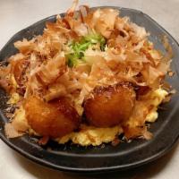 Takoyaki · Fried batter ball with diced octopus, cabbage, and onions served on Japanese egg salad.(6 pi...