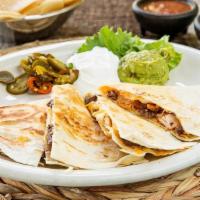 Lunch Quesadilla · Half order of our regular quesadillas (4 pieces) with your choice of either beef, chicken or...