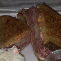 Reuben · Choice of Corned Beef or Pastrami with Swiss, Russian Dressing and Sauerkraut on Grilled Rye
