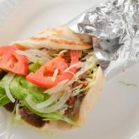 Lamb Or Chicken Gyro · Gyro, lettuce, tomatoes, and onions covered with your choice of cucumber sauce or honey must...