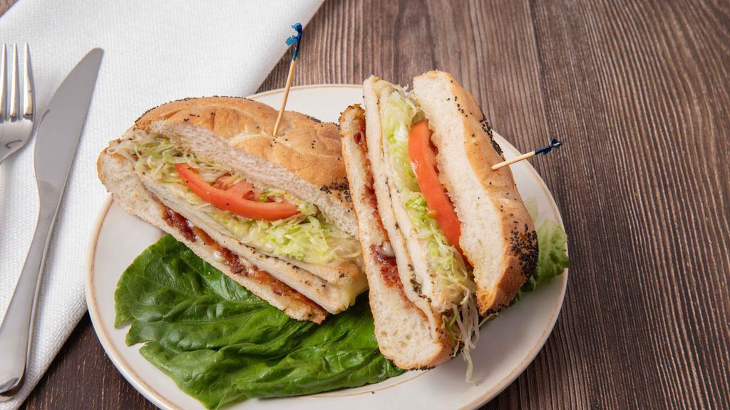 Club Sandwich · Double decker stack of imported danish ham oven roasted turkey breast, bacon, lettuce, tomatoes, and mayonnaise. Served on toasted white or wheat bread.