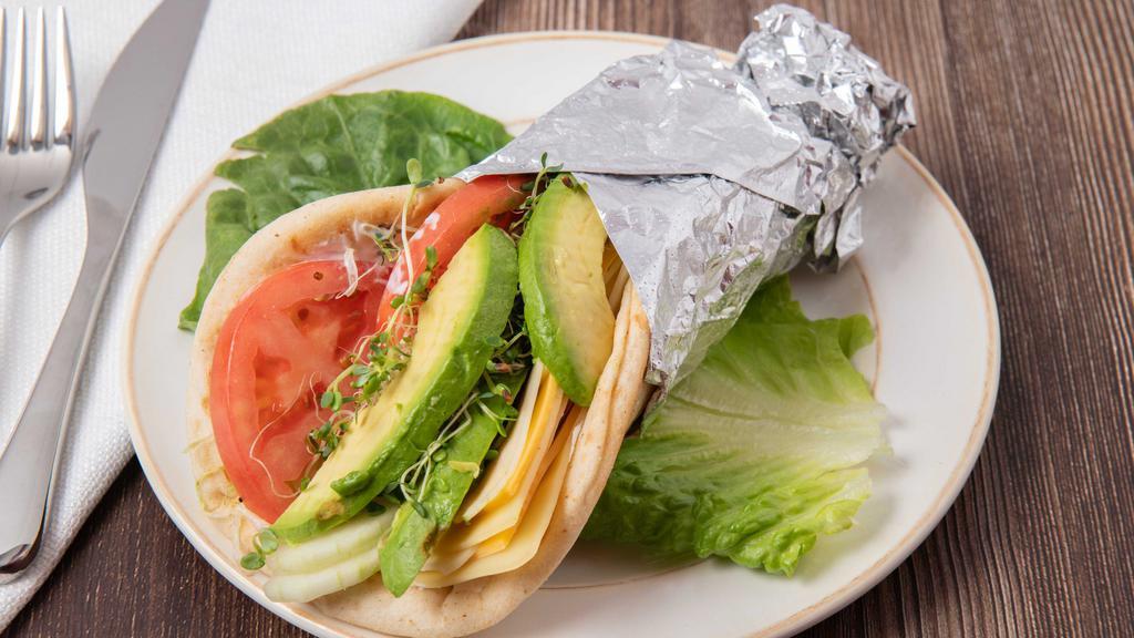 Health Delight · Provolone, swiss, and American cheese with avocado, sprouts, cucumbers, lettuce, tomatoes, and cucumber dressing. Served on pita bread.