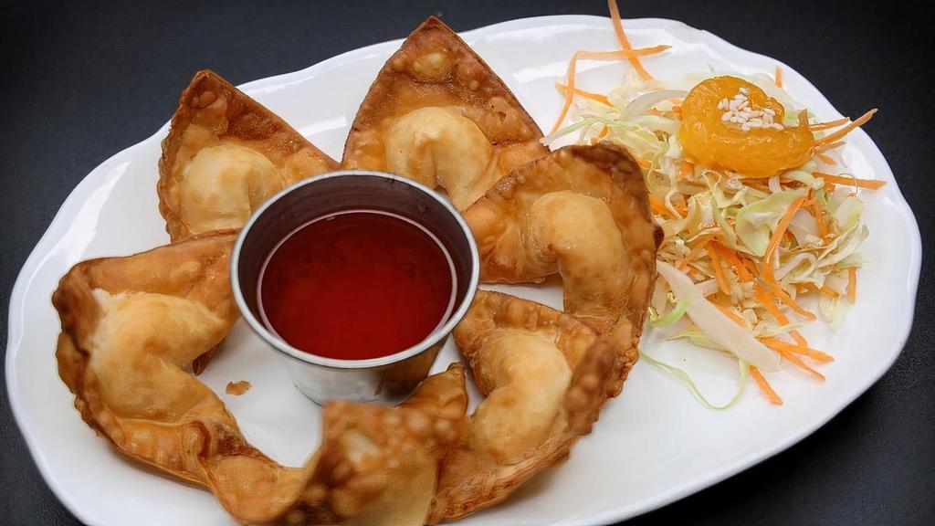 Cheesy Wonton · CRISPY FRIED WONTON STUFFED WITH WATER CHESTNUT AND CREAM CHEESE, SERVED WITH OUR HOUSE MADE PLUM SAUCE (6 PCS). VEG