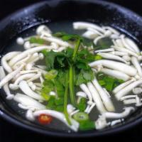 Sm Tom Yum · THAI HOT AND SOUR LEMONGRASS SOUP WITH BEECH MUSHROOM, SPRING ONIONS AND YOUR CHOICE OF PROT...