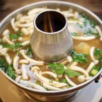 Lg Tom Yum · THAI HOT AND SOUR LEMONGRASS SOUP WITH BEECH MUSHROOM, SPRING ONIONS AND YOUR CHOICE OF PROT...