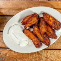 Platanos Fritos · Sweet fried platains. Served with sour cream on the side.