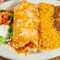 Pork Burrito · Topped with ranchera sauce. A large flour tortilla rolled with with pork, topped with ranche...