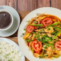 Pollo Saltado · Strips of grilled chicken breast, sauteed with white wine, tomatoes, onions, celery, green p...