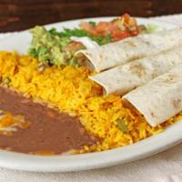Tacos Al Carbon · Three soft fresh flour tortillas, filled with your preference. Served with Mexican rice, ref...